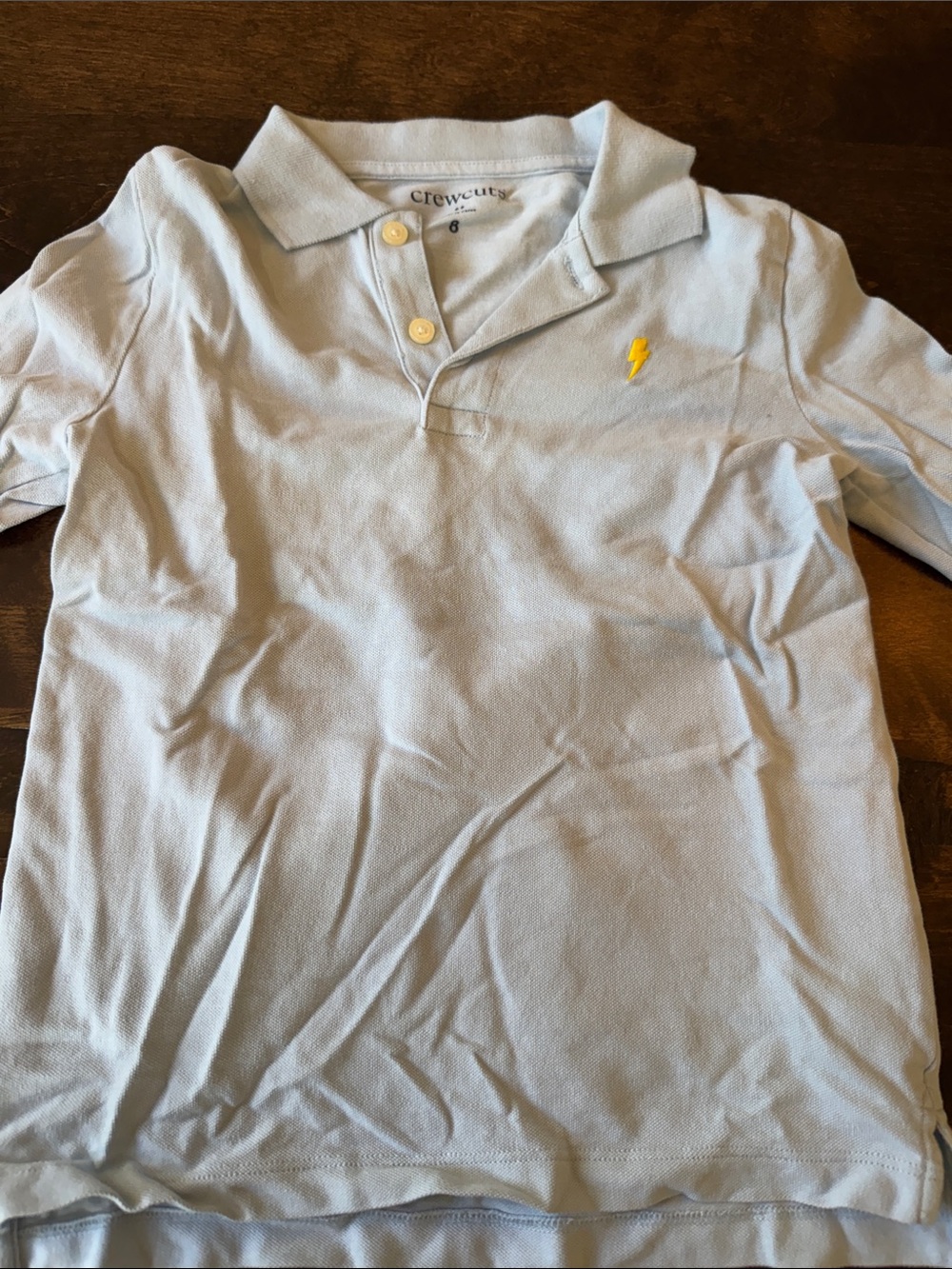 Crewcuts Light Blue Polo with Yellow Lightning Emblem